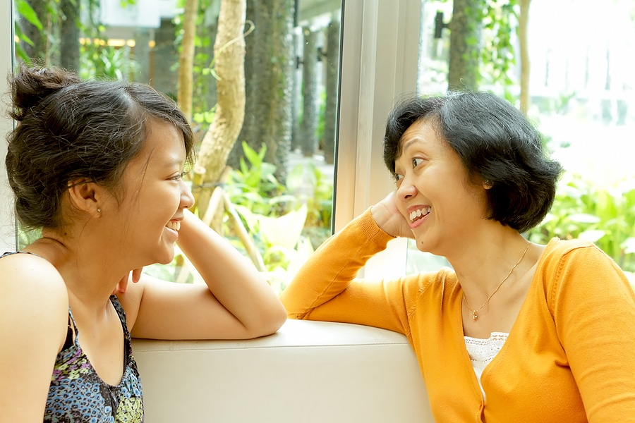 asian mother and daughter talking happy